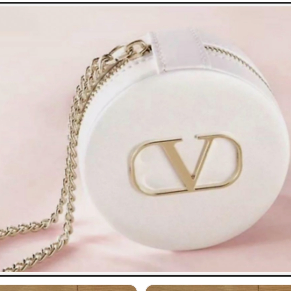 Valentino Round White & Gold Wristlet